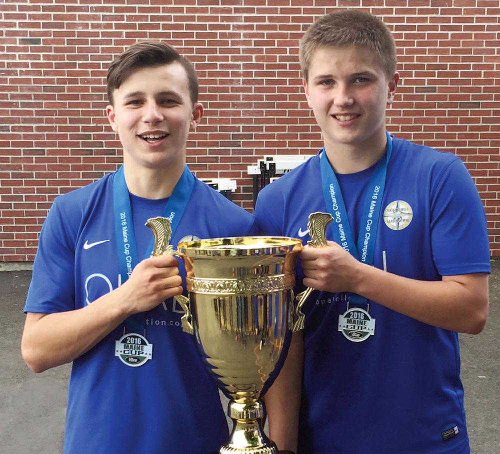 Michael Wildes, left, and Jake Warn, both of Winslow, are starters on the U16 Seacoast Mariners premier soccer team. On June 12 they defeated GPS Phoenix, 7-0, to win the State Cup for the third consecutive year.                         Photo courtesy of Central Maine Photography