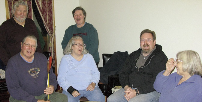 Phil White Hawk, Cindy Keller, Tom Thornton III, and Laura Sullivan. Standing, Mike Dunn and Judy Thornton