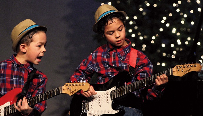 Brothers Conner and Cameron Mushero perform at the Warming Up For Christmas concert on December 3.                               Photo by Mark Huard, owner Central Maine Photography