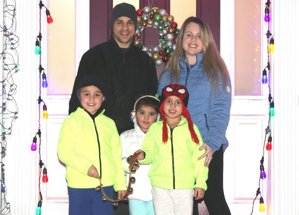 Winslow’s Garay family ringing the bells of Christmas