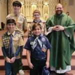 Scouts with fr March at St Marys